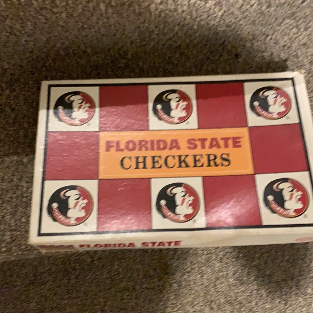 Florida State checkers set, plastic. Not Redskins,  like new just don’t need